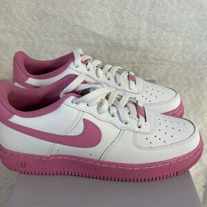 Pink and White Nike Tennis Shoes